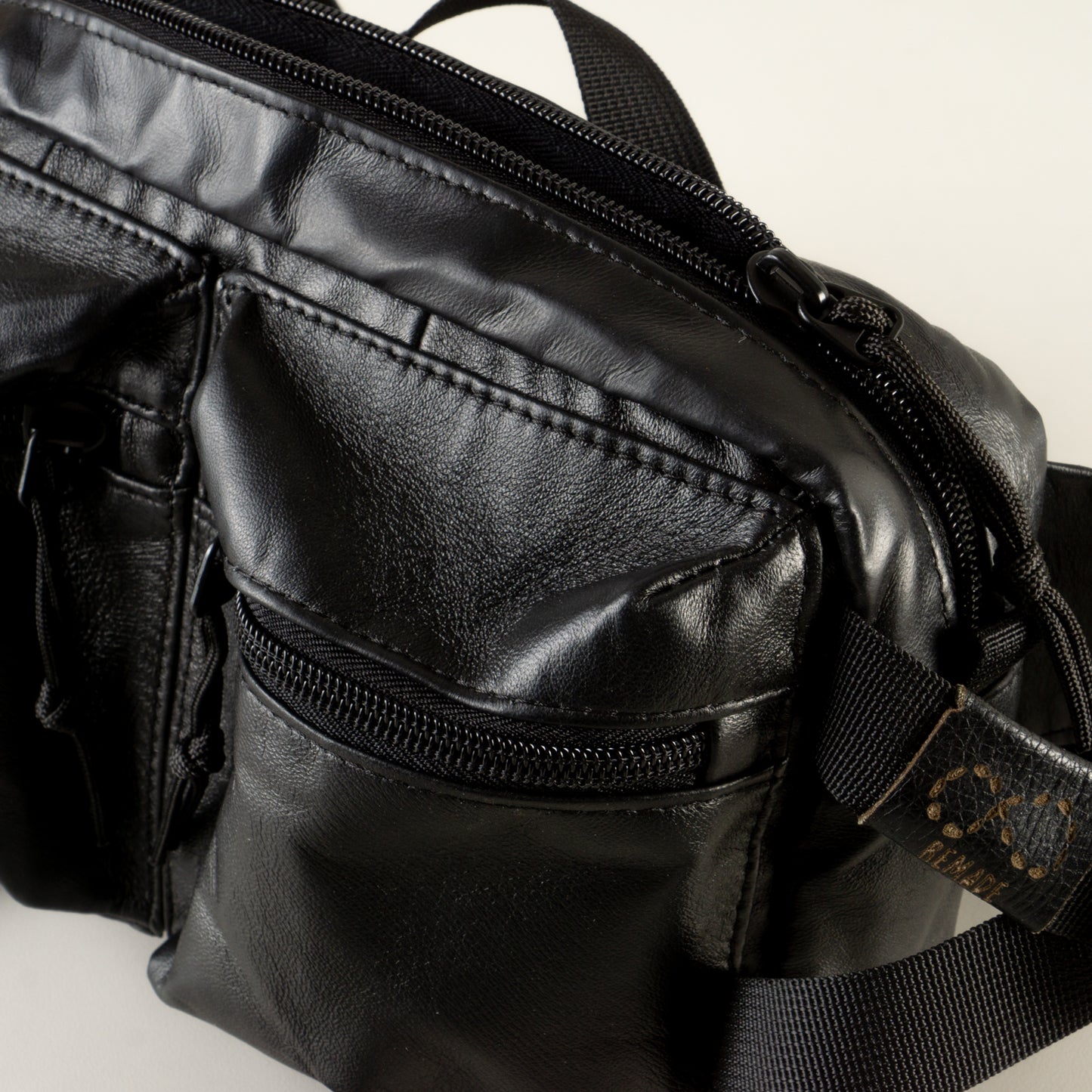 Large black leather sling bag with pockets "September"