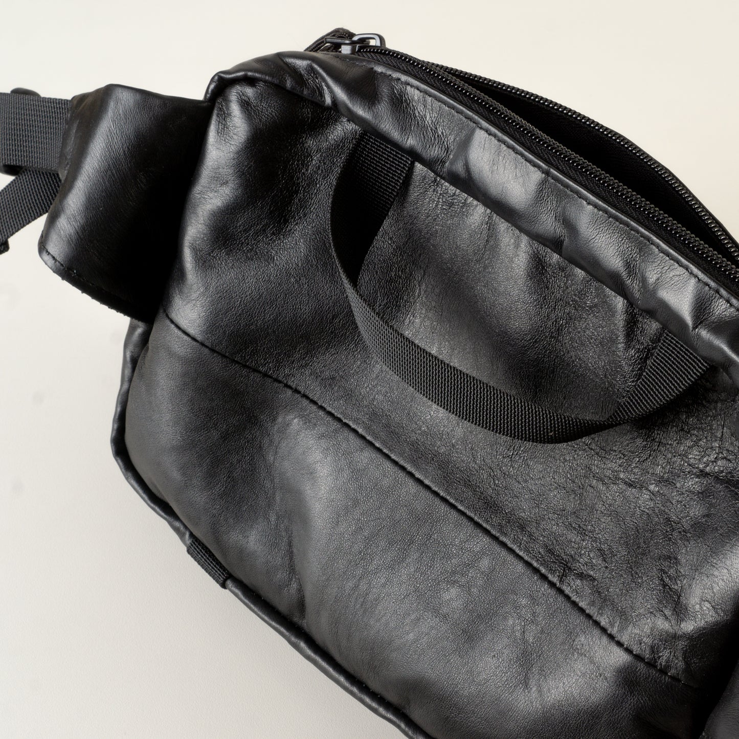 Large black leather sling bag with pockets "September"